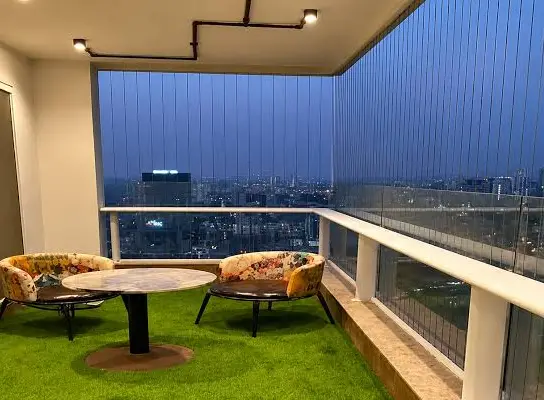 Completed invisible grill balcony installation